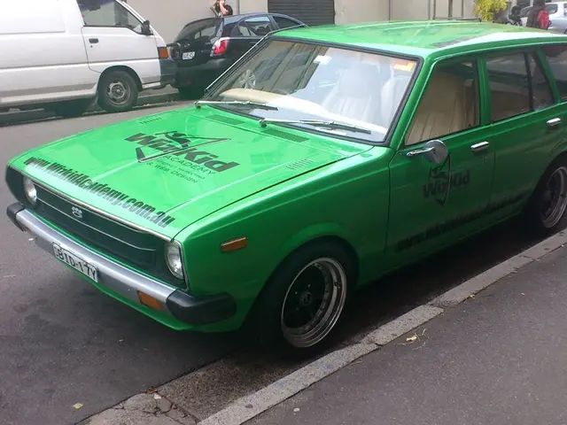 A BMW motorist attempts a turn on the street, meeting an oncoming vehicle