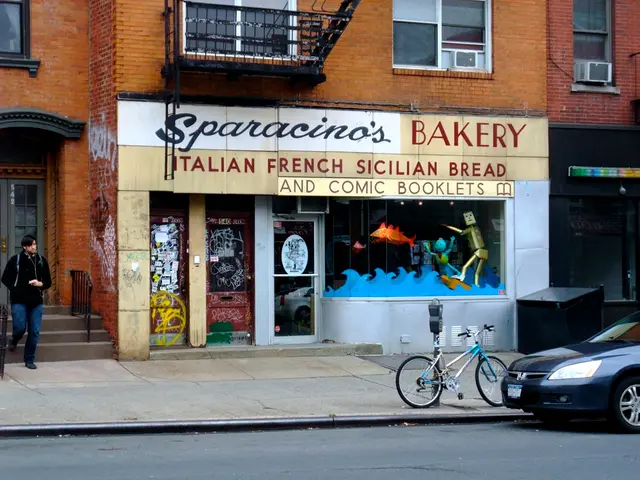 In this image there is a car on the road,there is a bicycle, parking meter, a person standing,...