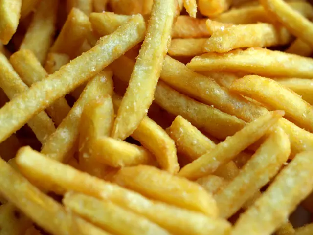 In this image there are fried chips.