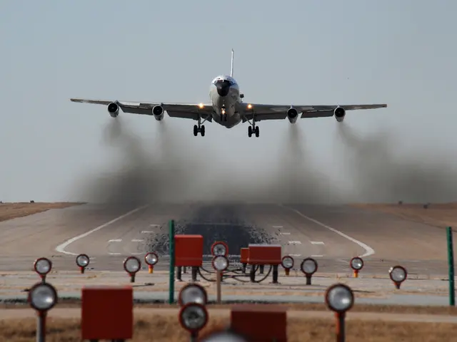 In this image there is a runway in the middle. At the top there is an airplane. At the bottom there...